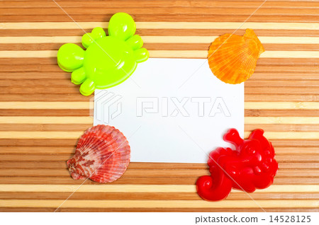 Paper card and seashells toy shovel Paper card and seashells toy shovel 14528125