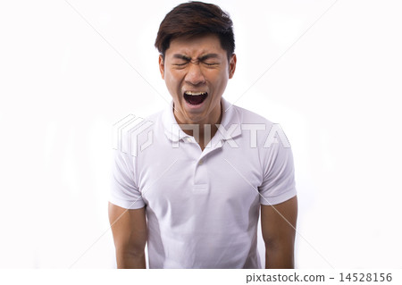 Angry young man shouting 14528156