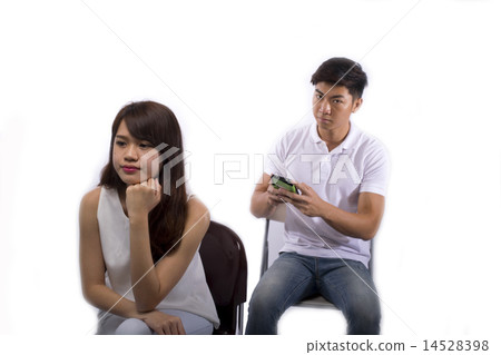 Young lady angry with man neglecting her 14528398