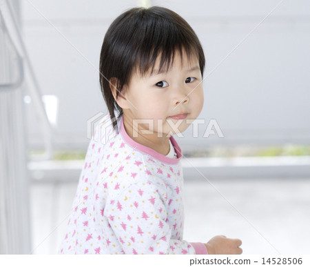 Cute 2-year-old child on the stairs Cute 2-year-old child on the stairs 14528506