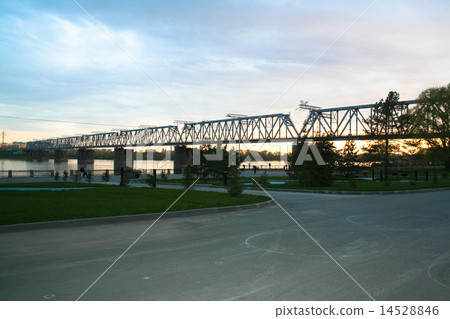 sunset through railway bridge 14528846
