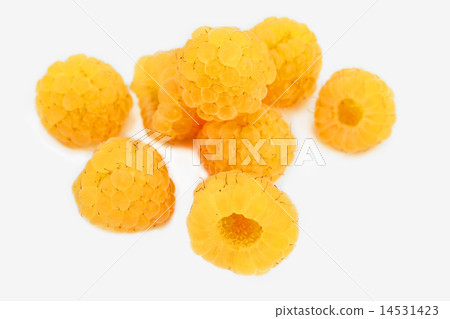 Handful of yellow raspberries 14531423