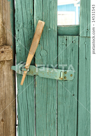 Wooden hasp on the gate 14531543