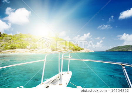 White yacht near rocky coast of seychelles. White yacht near rocky coast of seychelles. 14534862