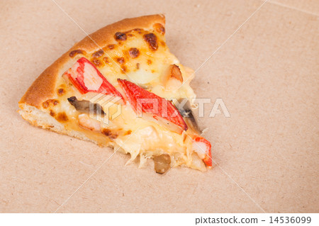 Island Delight pizza on recycle paper background 14536099