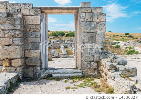 wall of stones with a hole under the door wall of stones with a hole under the door 14536327