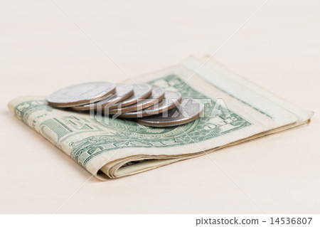 used US banknotes on wood table close up used US banknotes on wood table close up 14536807