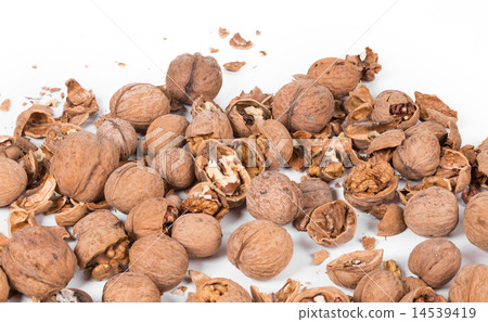 Heap of cracked walnuts close up. Heap of cracked walnuts close up. 14539419
