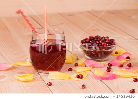 Juice and ripe pomegranate grains. Juice and ripe pomegranate grains. 14539430