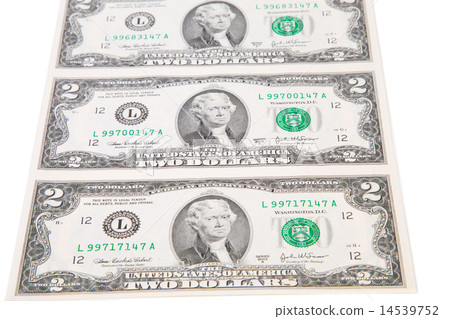 Two dollar bills. Two dollar bills. 14539752
