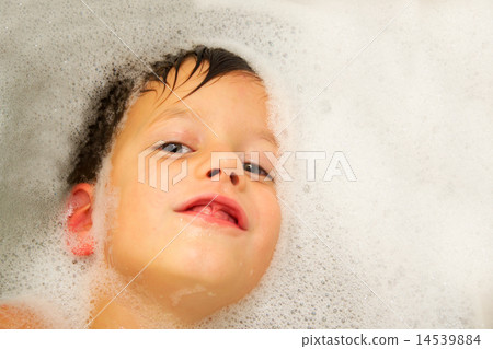 happy baby face in bubble bath 14539884