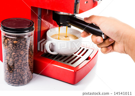 Brewing coffee with a red color coffee machine 14541011