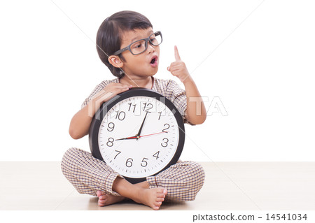 boy is holding big clock 14541034