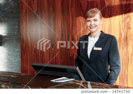 Charming receptionist at work Charming receptionist at work 14541730