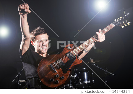 Guitar performer during the concert 14544254