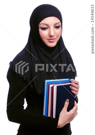 Young muslim woman with book on white 14549015
