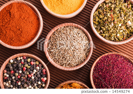 set dry spices in a wooden bowl close-up set dry spices in a wooden bowl close-up 14549274