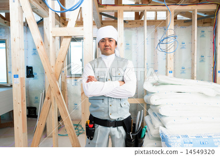 Carpentry working at home construction site 14549320