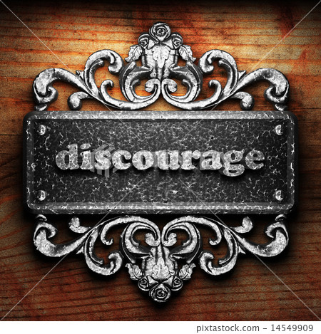 discourage word of iron on wooden background 14549909