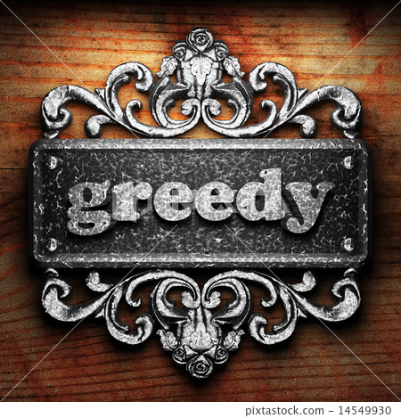 greedy word of iron on wooden background 14549930