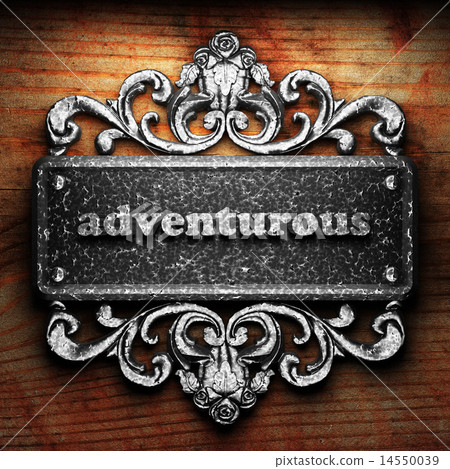 adventurous word of iron on wooden background 14550039