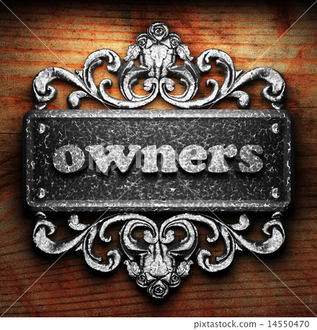 owners word of iron on wooden background 14550470