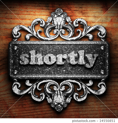 shortly word of iron on wooden background 14550851