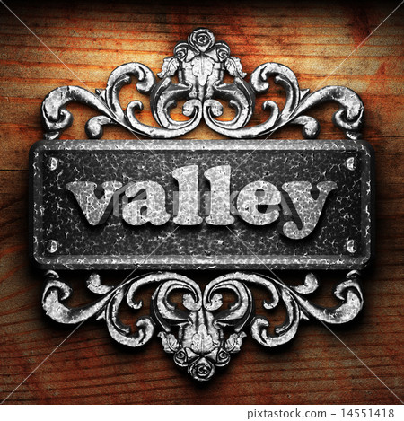 valley word of iron on wooden background 14551418