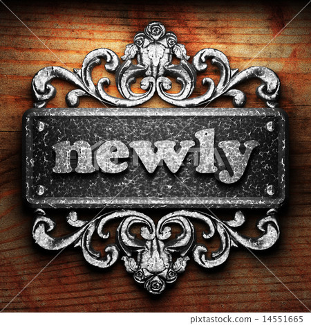 newly word of iron on wooden background 14551665