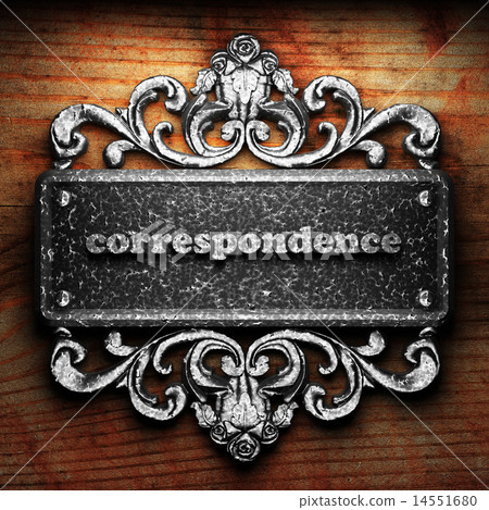 correspondence word of iron on wooden background 14551680