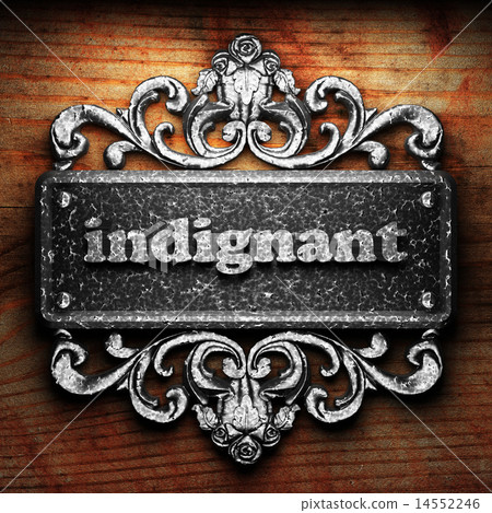indignant word of iron on wooden background 14552246