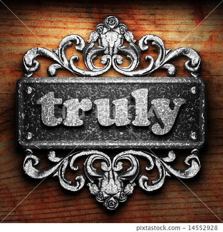 truly word of iron on wooden background 14552928
