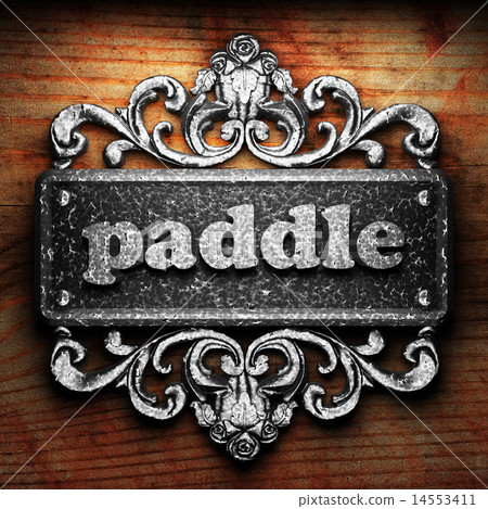 paddle word of iron on wooden background 14553411