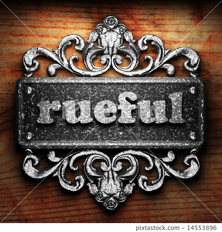 rueful word of iron on wooden background 14553896