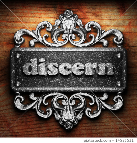 discern word of iron on wooden background 14555531