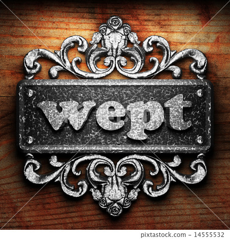 wept word of iron on wooden background 14555532