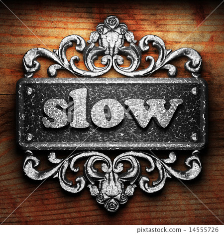 slow word of iron on wooden background slow word of iron on wooden background 14555726