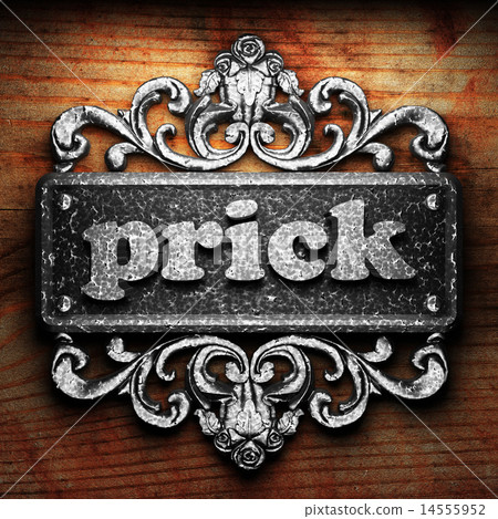 prick word of iron on wooden background 14555952