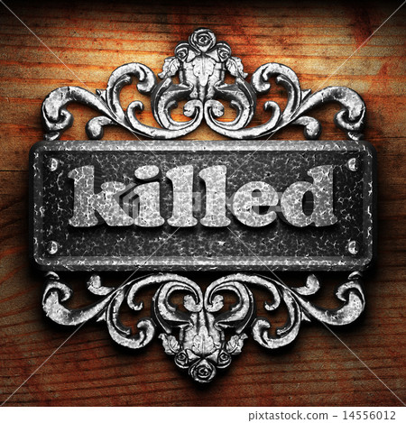 killed word of iron on wooden background killed word of iron on wooden background 14556012