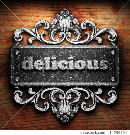 delicious word of iron on wooden background 14556204