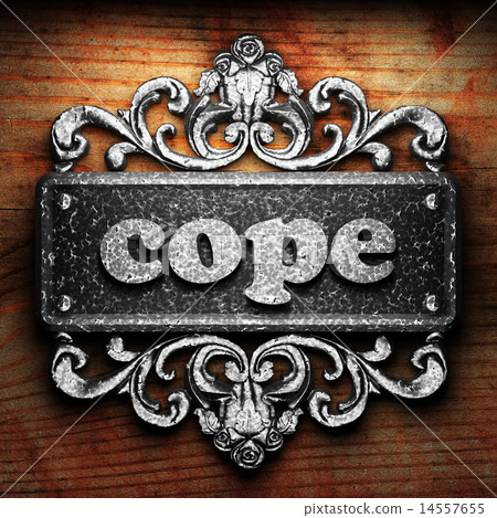 cope word of iron on wooden background 14557655