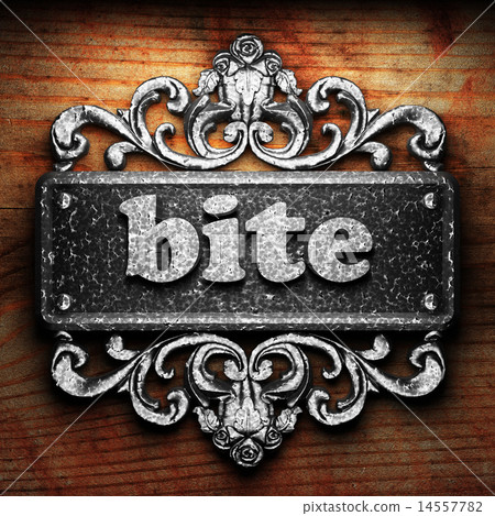 bite word of iron on wooden background 14557782