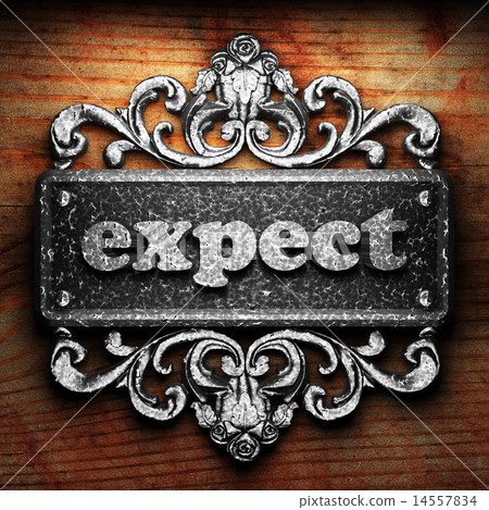 expect word of iron on wooden background 14557834