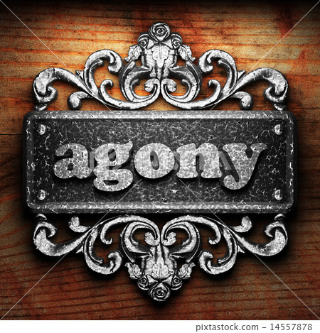 agony word of iron on wooden background agony word of iron on wooden background 14557878