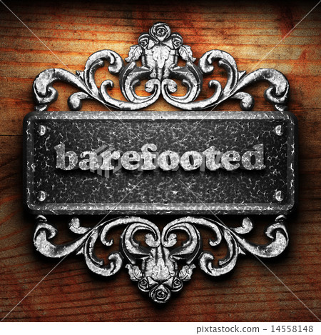 barefooted word of iron on wooden background barefooted word of iron on wooden background 14558148