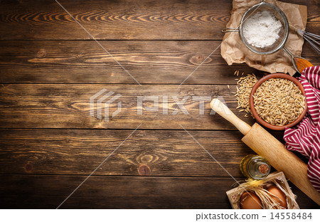 Ingredients for baking on empty wooden background Ingredients for baking on empty wooden background 14558484