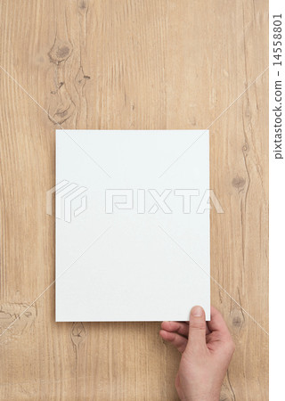 Hand with white paper 14558801