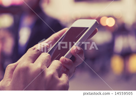 Woman Using a Smart Phone 14559505