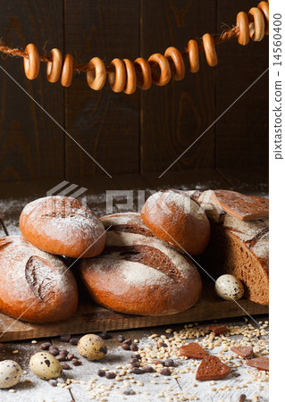 Variety of rye bread on a wooden background with milk Variety of rye bread on a wooden background with milk 14560400