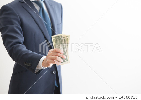 Businessman who takes out banknotes from the chest 14560715